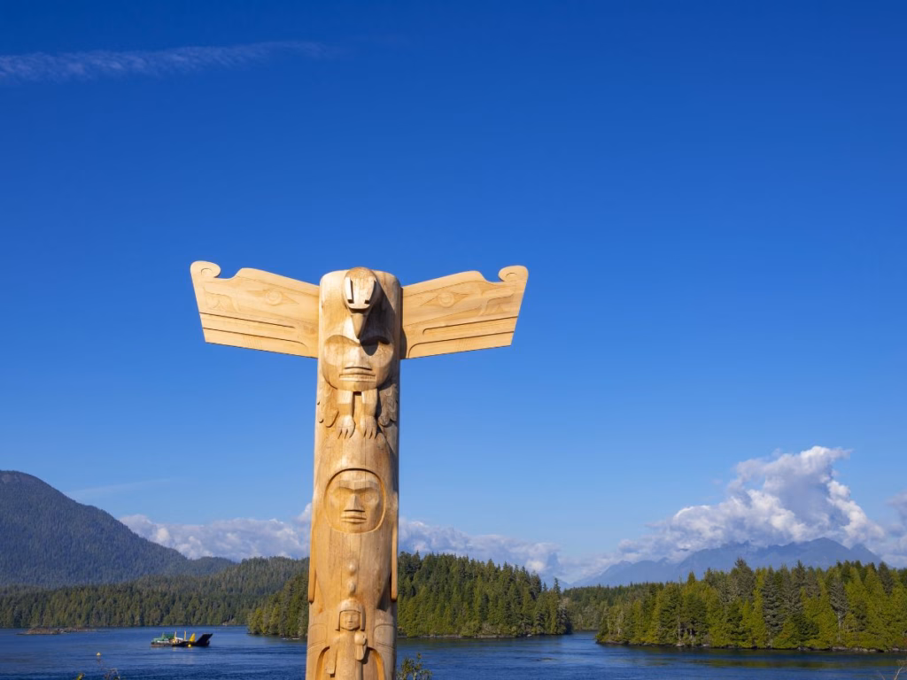 Totem Pole with Meares Island in the background